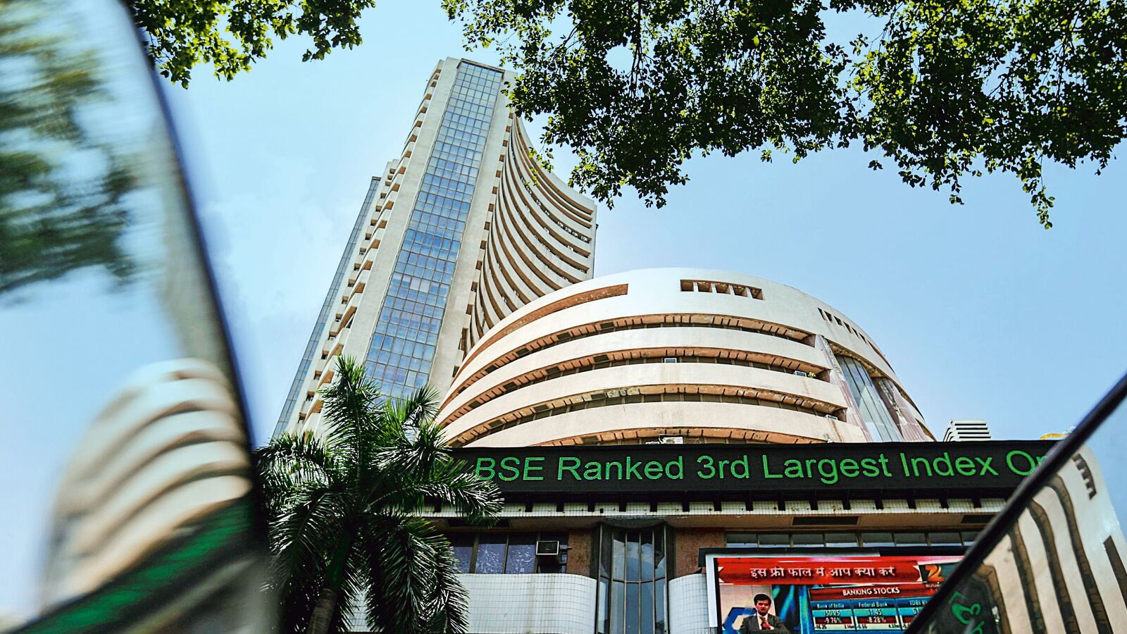 The Bombay Stock Exchange (BSE) building is pictured next to a police van in Mumbai, India, August 24, 2015.